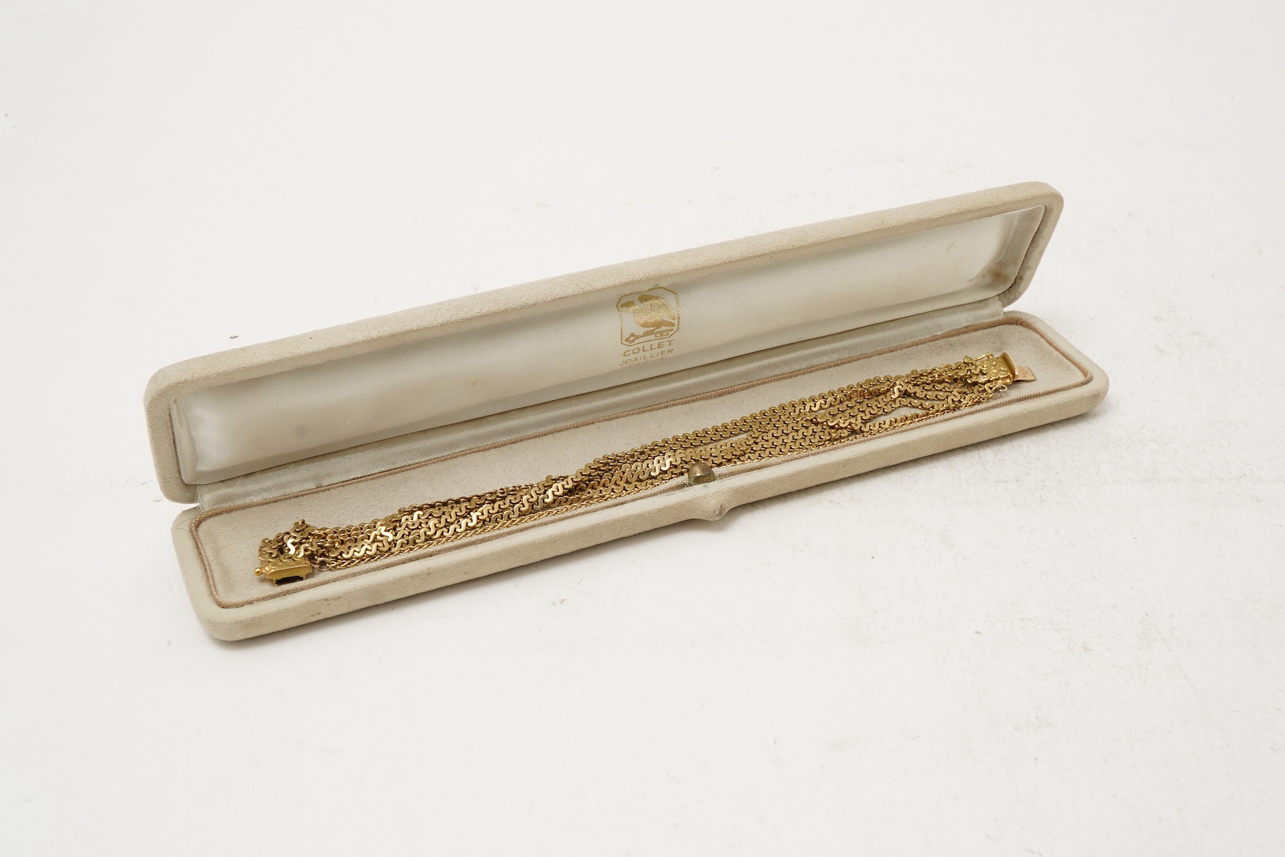 A gold bracelet, 1970s